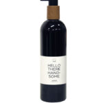 Handzeep zwarte fles met tekst Hello there handsome geur vijg
