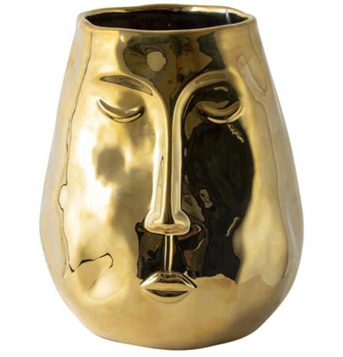 Gouden vaas met gezicht