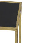Bovenkant gouden wandtafel met zwart blad