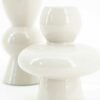 Set van twee kandelaars metaal beige