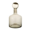 Grijze fles glas rond
