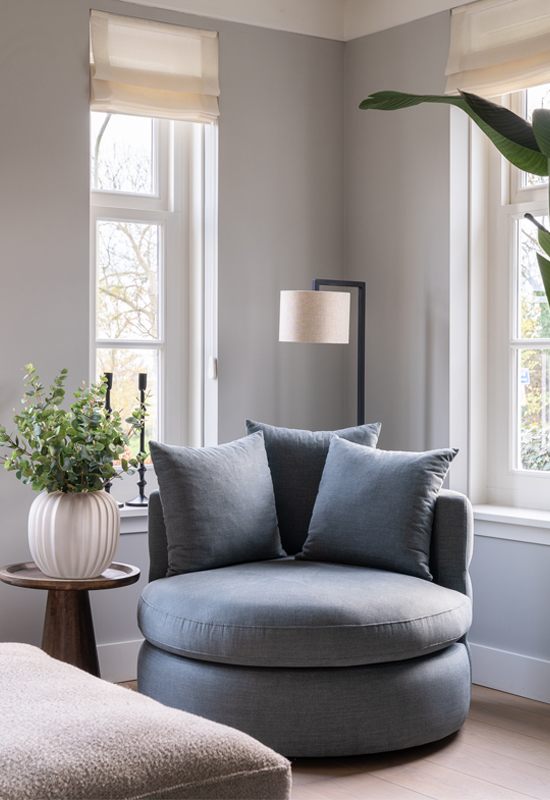 Ronde blauwe fauteuil stof