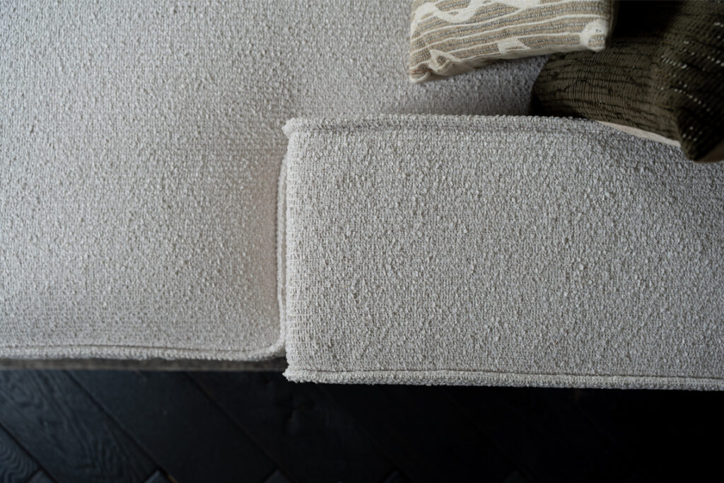 Beige stoffen hoekbank boucle