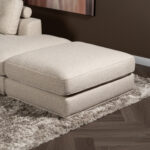 Hocker aan ligelement bank beige stof