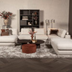 Hoekbank twee liggedeeltes met poef beige stof