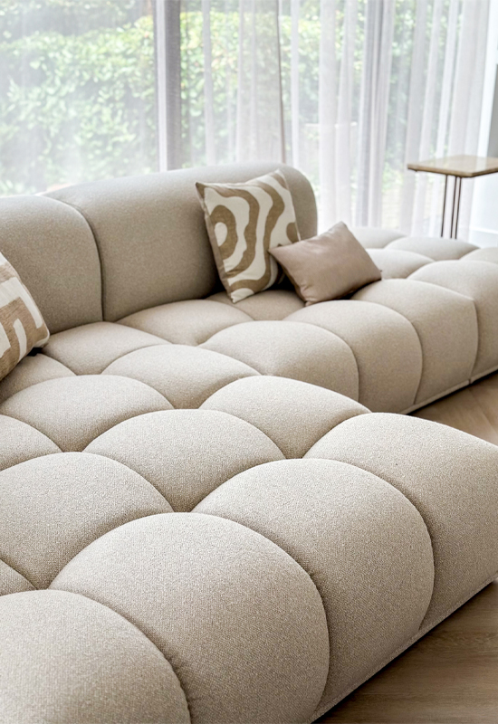 Stoffen beige hoekbank