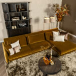 Gouden metalen poot hoekbank stof