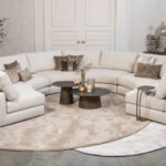 Hoekbank rond stof beige