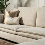 Beige hoekbank stof kussens