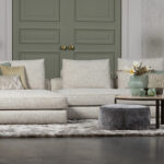 Beige hoekbank stof laag op de grond