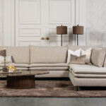 Beige stoffen hoekbank dubbele kussens