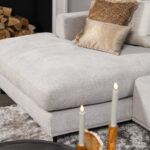 Grijze stoffen hoekbank ligelement