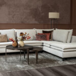 Hoekbank beige stof dubbele kussens