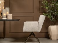Beige stoffen stoel armleuning draaibaar