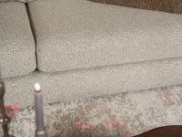 Stoffen bank beige hoek